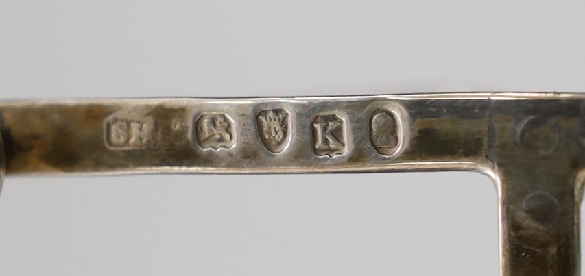A George III silver seven bar toast rack, Soloman Hougham, London, 1805. length 15cm, 180 grams, (a.f.).